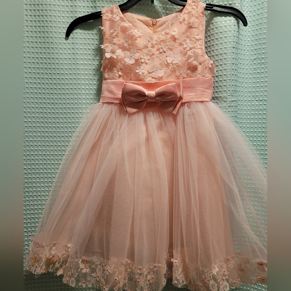 Very pretty dress can be worn to wedding or Easter.